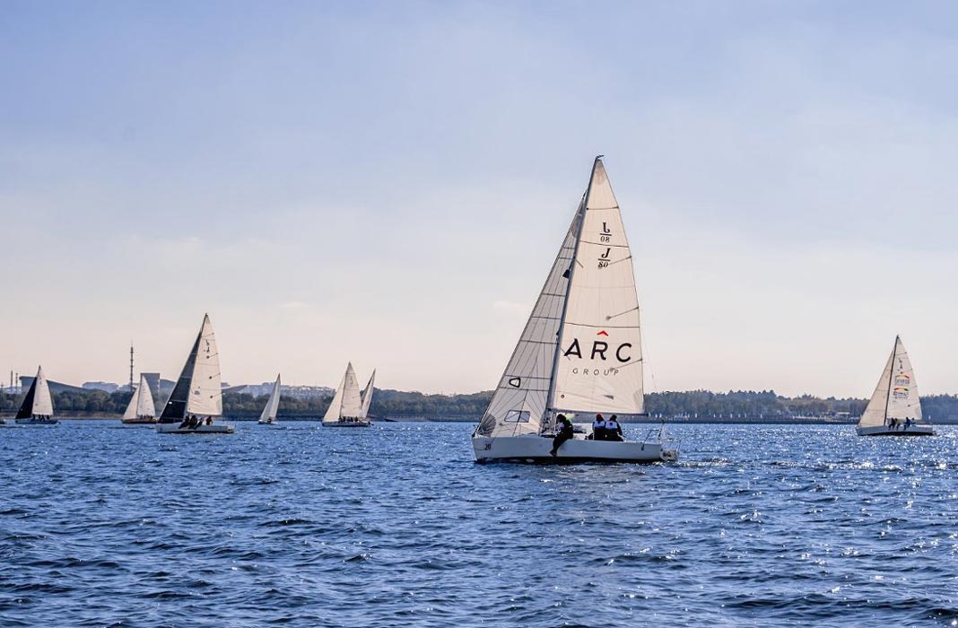 ARC Group-sponsored sailing team on the water during the 2025 Shanghai Sailing Regatta