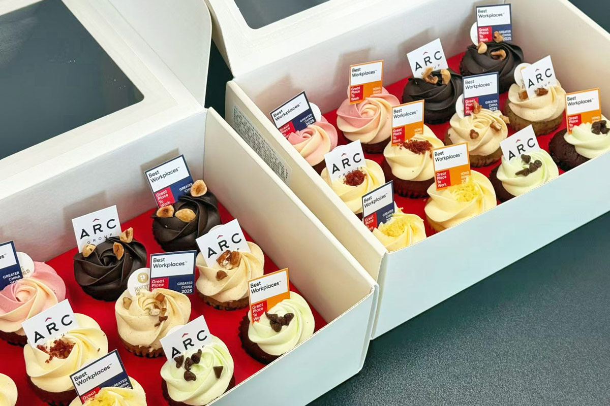 Cakes with Best Workplaces and ARC Group flags